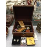A WOODEN BOX WITH DECORATIVE METAL FEATURES AND A QUANTITY OF COSTUME JEWELLERY, BADGES, WATCHES AND