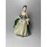 A ROYAL DOULTON FIGURE ELEGANCE HN 2264