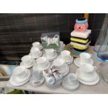 AN ASSORTMENT OF CERAMIC ITEMS TO INCLUDE TRIOS AND A BERTIE BASSETT JAR ETC