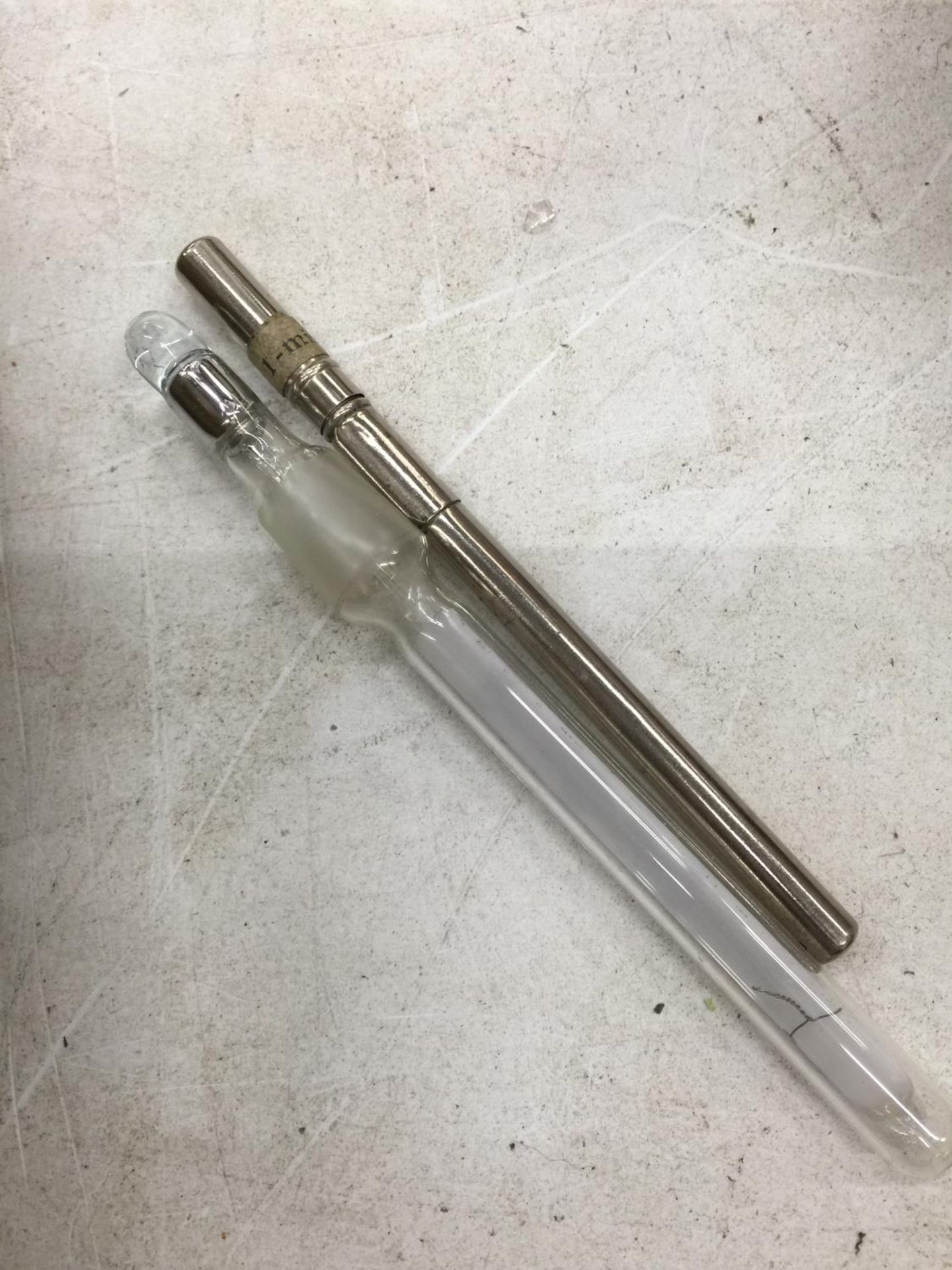 TWO VINTAGE THERMOMETERS ONE IN A SILVER PLATED CASE