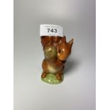 A BESWICK BEATRIX POTTER FIGURE SQUIRREL NUTKIN WITH GOLD BACK STAMP