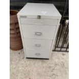 A FOUR DRAWER MINITURE BISLEY FILING CABINET