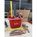 A LARGE ASSORTMENT OF TOOLS TO INCLUDE HAMMERS, SPIRIT LEVEL AND WOOD PLANES ETC