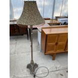 A WIDDOP BINGHAM & CO BRASS AND RESIN SSTANDARD LAMP COMPLETE WITH SHADE