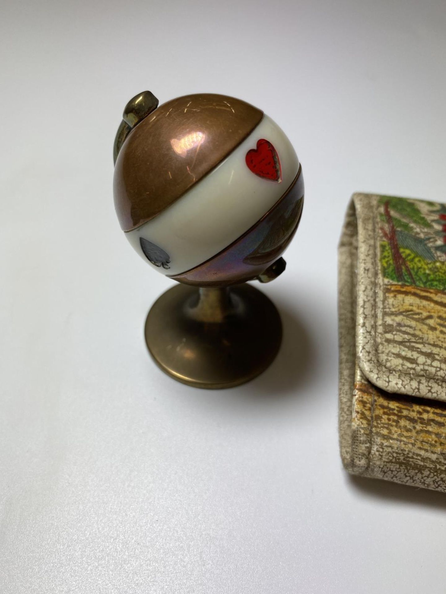 TWO ITEMS - ART DECO BRASS & COPPER CARD SUIT SPINNING DESK BALL AND ORIENTAL PURSE - Image 3 of 3