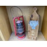 A VINTAGE PINE CANDLE BOX AND A PARAFIN LAMP