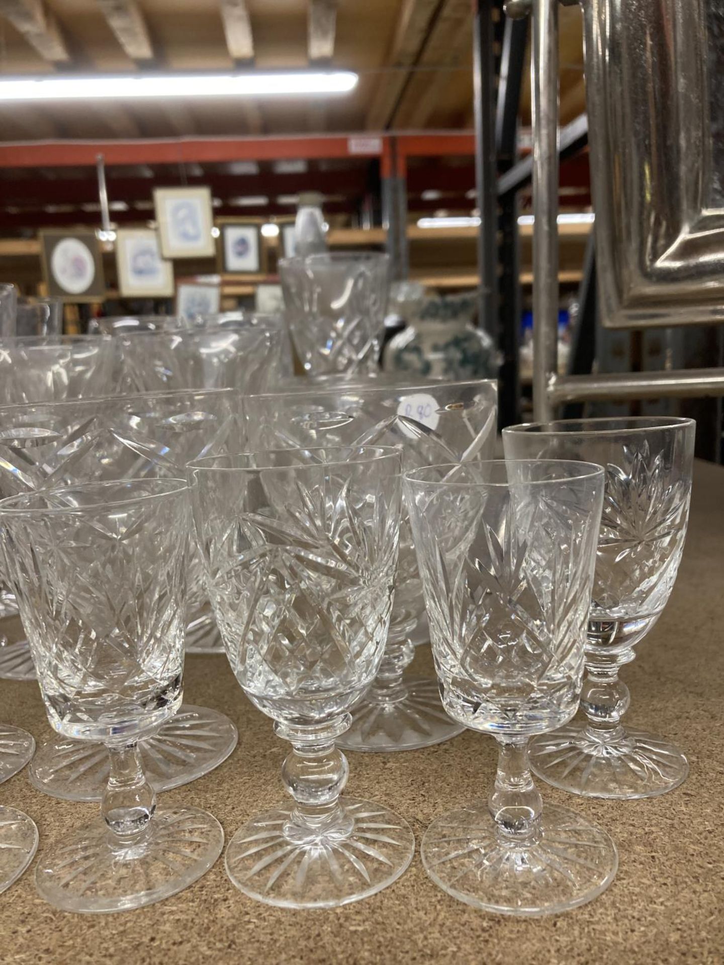 A COLLECTION OF CUT GLASS GLASSES TO INCLUDE CHAMPAGNE FLUTES, WINE, SHERRY, ETC - Image 3 of 4