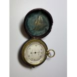 AN EARLY 20TH CENTURY COMPENSATED POCKET BAROMETER BY NEGRETTI & ZAMBRA, LONDON WITH ORIGINAL