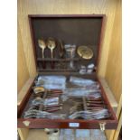 A WOODEN CASED CANTEEN OF CUTLERY
