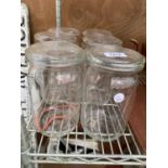 A SET OF SIX GERRIX GLASS STORAGE JARS