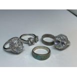 FIVE MARKED SILVER RINGS THREE WITH LARGE CLEAR STONES