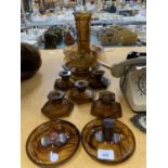 A COLLECTION OF AMBER COLOURED CLOUD GLASS TO INCLUDE CANDLESTICKS, BOWLS, VASE, ASH TRAYS, ETC