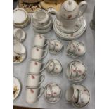 A QUANTITY OF JOHNSON BROS SUMMERFIELD POPPY DINNERWARE TO INCLUDE PLATES, CUPS, SAUCERS, PLATES,