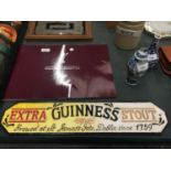 A CAST GUINNESS SIGN 56CM X 12CM