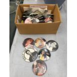 A COLLECTION OF ELVIS PRESLEY BADGES AND KEY RINGS