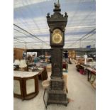 A JOHN DAY EIGHT-DAY LONGCASE CLOCK WITH BRASS ROLLING MOON FACE, PROFUSELY CARVED WITH MYTHICAL