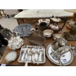 A LARGE ASSORTMENT OF SILVER PLATED ITEMS TO INCLUDE A COFFEE SERVICE SET, SPOONS AND A SUGAR SHAKER
