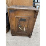 A VICTORIAN SAFE BEARING A BRASS PLAQUE 'FREDERIC WHITFIELD & CO' COMPLETE WITH KEY