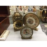 THREE VINTAGE CLOCKS TO INCLUDE A BRASS LANTERN CLOCK, A PETIT POINT MANTLE CLOCK AND ALARM CLOCK
