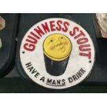 A CAST GUINNESS STOUT SIGN DIAMETER 24CM