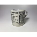 AN EARLY 19TH CENTURY POTTERY POEM CUP / MUG - 'FLOWERS NEVER FADE' (A/F)