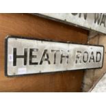 A VINTAGE METAL 'HEATH ROAD' ROAD SIGN