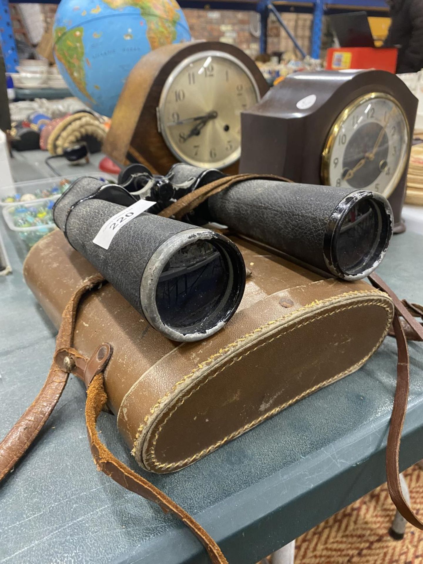 A PAIR OF VINTAGE LIEBERMAN AND GORTZ BINOCULARS IN A CASE