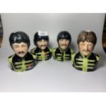 A SET OF FOUR LIMITED EDITION LEGENDS OF ROCK AND ROLL BAIRSTOW MANOR COLLECTABLES BEATLE TOBY JUGS