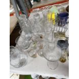 A MIXED LOT OF GLASSWARE AND CERAMICS TO INCLUDE WINE GLASSES, TUMBLERS, SHOT GLASSES, STORAGE JARS,