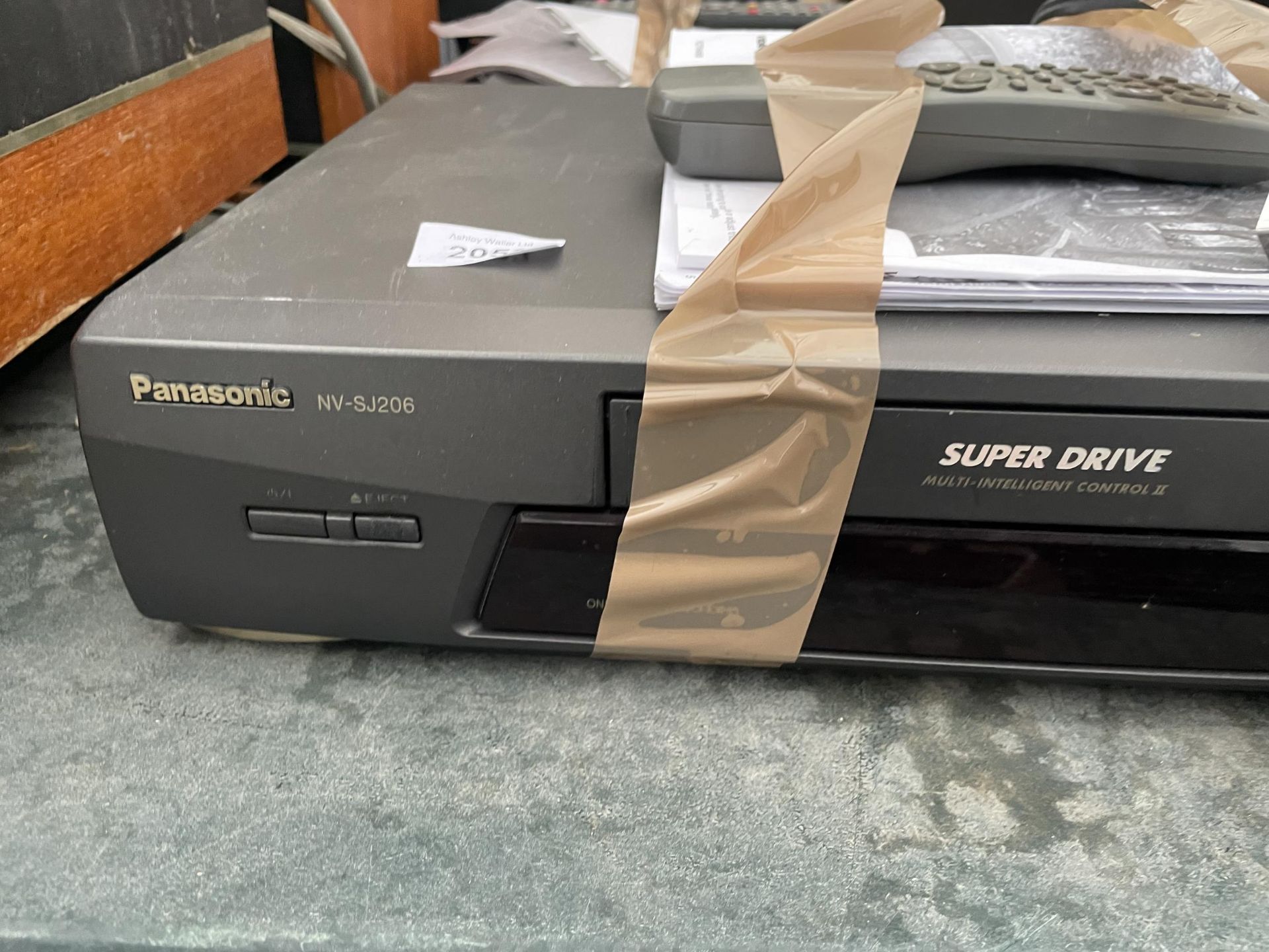 A PANASONIC VHS PLAYER AND A TOSHIBA DVD PLAYER - Image 2 of 3