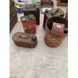 AN ASSORTMENT OF VINTAGE FUEL CANS AND DRUMS TO INCLUDE 'ESSO' AND 'GULF' ETC