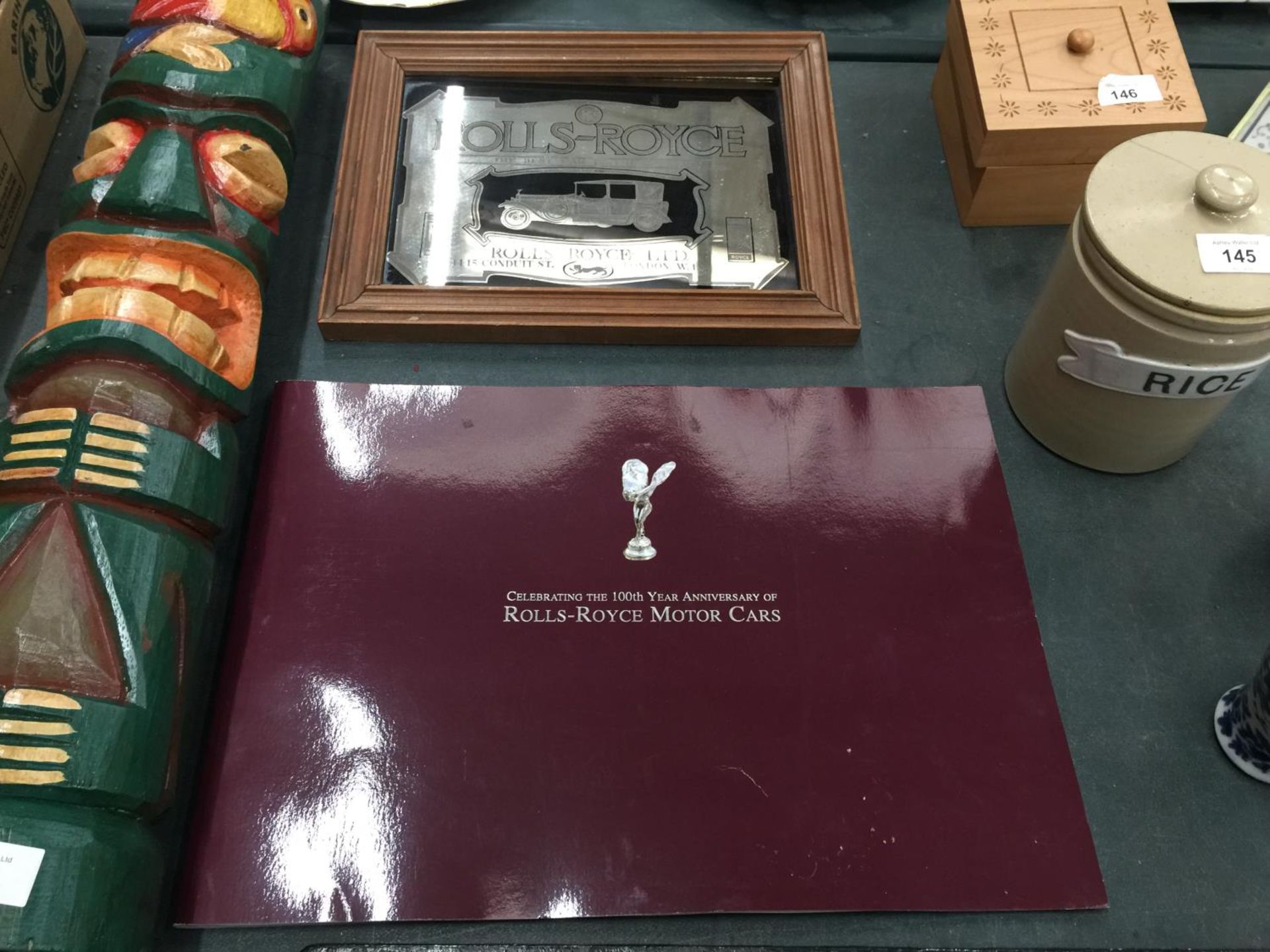A ROLLS ROYCE PICTURE MIRROR AND 100 YEARS OF ROLLS ROYCE CELEBRATION BOOK
