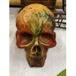 A COLLECTABLE RESIN MODEL OF A SKULL