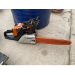 A STIHL MS171 PETROL CHAINSAW WITH THREE SPARE CHAINS