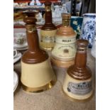 FOUR VINTAGE CERAMIC BELL'S WHISKY BELL SHAPED DECANTERS