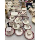 A LARGE QUANTITY OF RED AND WHITE CHINA CUPS, SAUCERS, PLATES, EGG CUPS, BOWLS, ETC TO INCLUDE PLANT