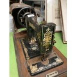 A VINTAGE JONES SEWING MACHINE WITH A CASE (CASE A/F)