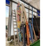 A LARGE QUANTITY OF WATER SPORTS EQUIPMENT TO INCLUDE WIND SURFING BOARDS, SAILS AND POLES ETC