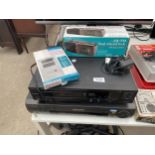 AN ASSORTMENT OF ITEMS TO INCLUDE A PANASONIC VHS PLAYER, A CROWN CD PLAYER AND AN ALARM CLOCK ETC