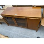 A RETRO TEAK ENTERTAINMENT UNIT WITH PULL-OUT SLIDES, 48" WIDE