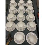 TWELVE COLCLOUGH RAPSODY IN BLUE TRIOS, TWO SPARE CUPS AND PLATES