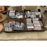 A LARGE ASSORTMENT OF CDS AND DVDS ETC