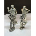 FOUR SILVER PLATED FIGURES THREE PLAYING MUSICAL INSTRUMENTS