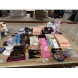 A LARGE QUANTITY OF MAKE UP INCLUDING ELIZABETH ARDEN, ULTIMA, MARKS & SPENCER'S, GUERLAIN AND