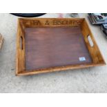 A WOODEN SERVING TRAY