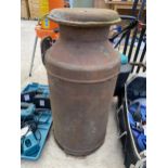 A VINTAGE CAST IRON MILK CHURN (MISSING ONE HANDLE, HEIGHT 71CM)