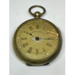 A BRASS JORDAN AND BENNET POCKET WATCH