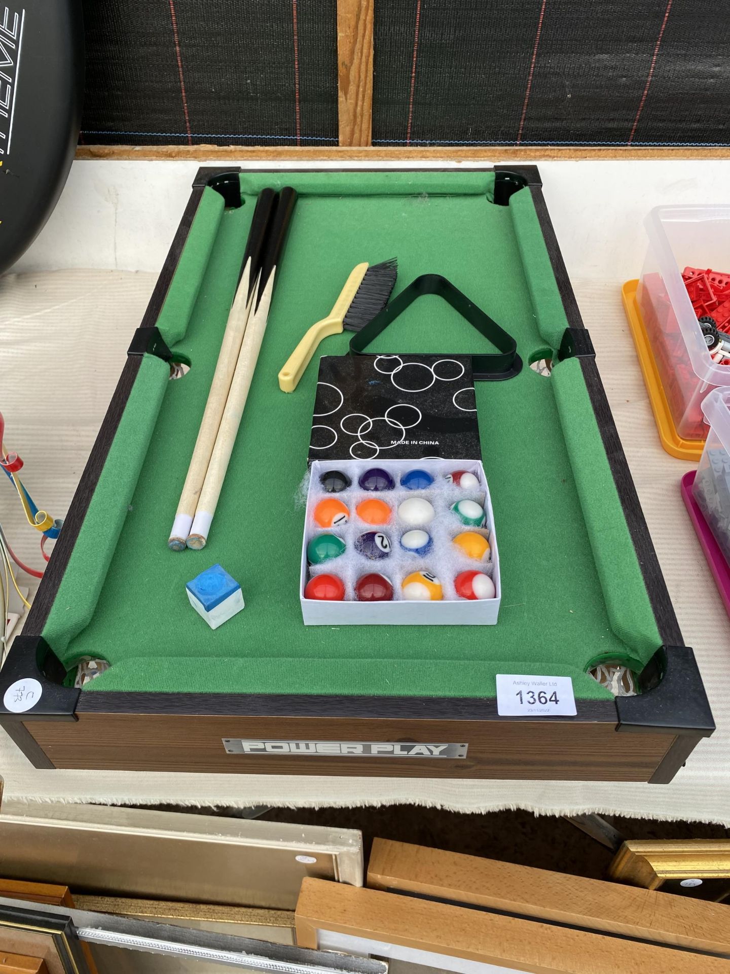 A POWER PLAY MINITURE TABLE TOP POOL TABLE WITH TWO CUES, BALLS AND TRIANGLE ETC