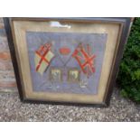 A WORLD WAR I FRAMED NAVAL NEEDLEWORK AND PHOTO MEMORIAL OF A NAVAL FAMILY, ONE FROM HMS RAMSEY (