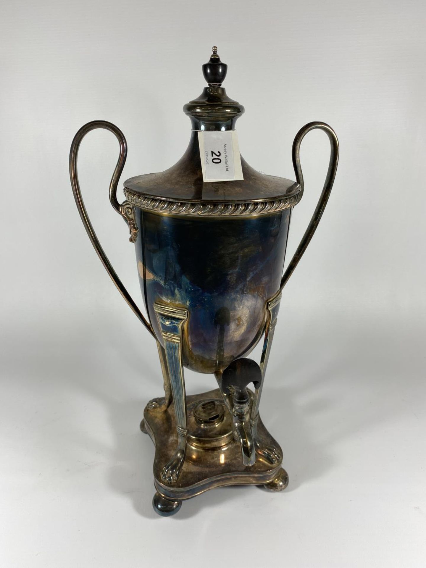 A VINTAGE SILVER PLATED TWIN HANDLED SAMOVAR WITH PAW DESIGN FEET